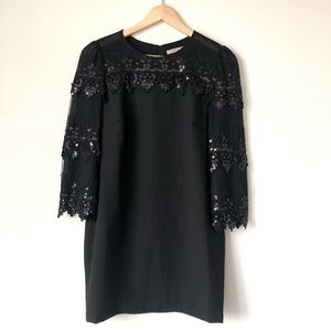 Black sequined long sleeve mini dress